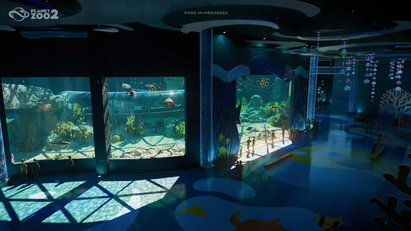 Indoor aquarium windows beside a visitor viewing route
